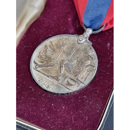 588 - Medals: two cased Imperial Service Medals, George VI and Elizabeth II.