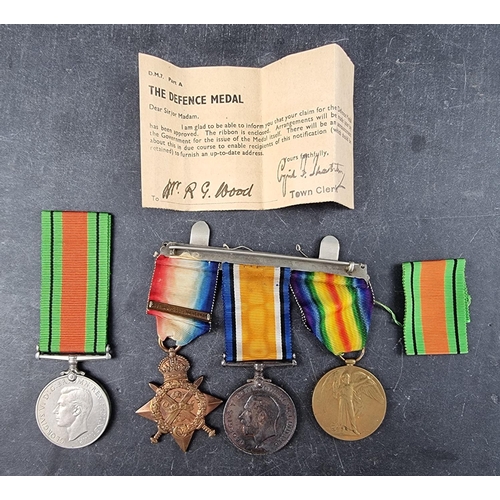 592 - Medals: A WWI trio to L. 11391 Ptr/Cpl R.G Wood 4/R.Fus, to include a 1914 star; together with a WWI... 