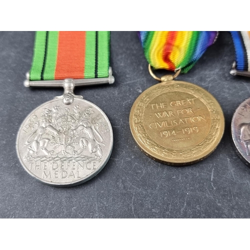 592 - Medals: A WWI trio to L. 11391 Ptr/Cpl R.G Wood 4/R.Fus, to include a 1914 star; together with a WWI... 