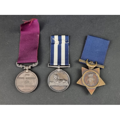 598 - Medals: a group of three medals, comprising: Egypt Medal 1882-89, to: 61 Pte H. Mower, 1 R. W. Kent ... 