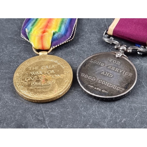 599 - Medals: a WWI War Medal and a George V Long Service and Good Conduct Medal, to: 5188, W.O C.1/M.M.S.... 