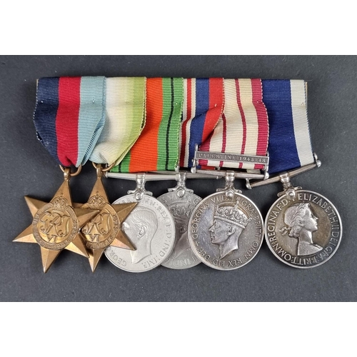 600 - Medals: a group of six WWII and later medals, to: C/MX 57568 W.E Hampton. SHPT.ART. 2/3rd Class R.N,... 