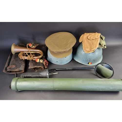 736 - A quantity of militaria, to include a helmet and a pair of leather cavalry gaiters.