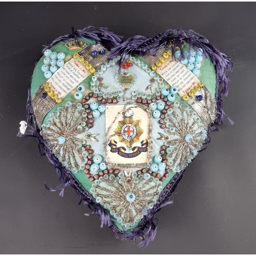 740 - A WWI Royal Sussex Regiment sweetheart pin cushion, 25cm high.