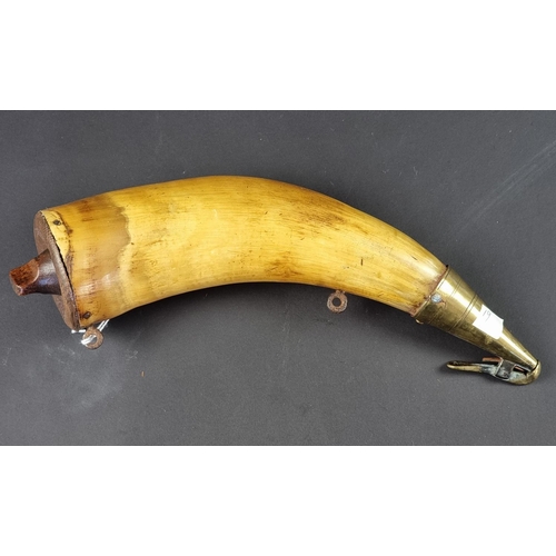 741 - A brass and wood mounted powder horn, 29cm.