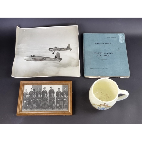 742 - An RAF pilot's flying log book, Flt Lt D.C Luck; together with three other items.