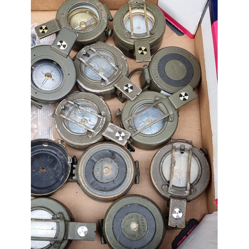 746 - A quantity of British army compasses, (spares or repairs).