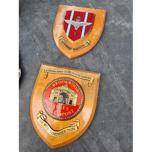 749 - A quantity of assorted mess plaques; together with a painted plaster pilot wall plaque and a brass p... 