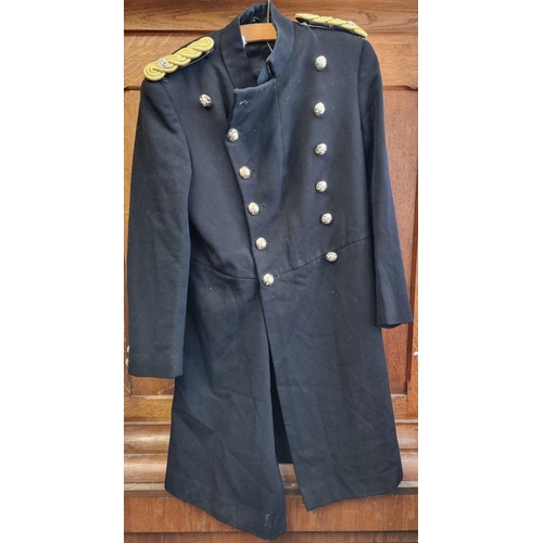 759 - A British army frock coat, possibly a Band Master's, with epaulettes for a Major.