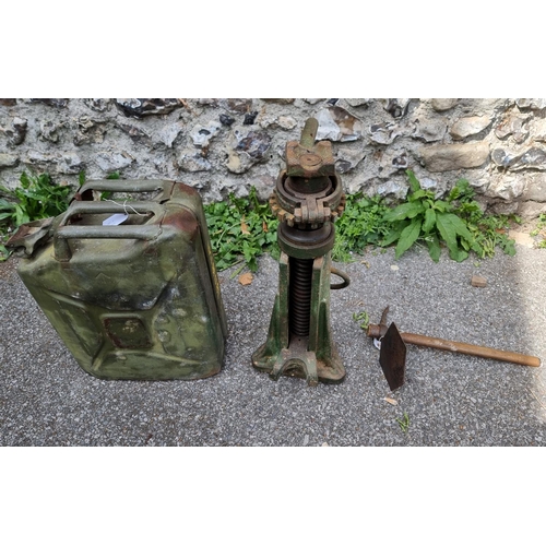 785 - A five ton jack; together with a military jerry; can and a WWII entrenching tool. (3)... 