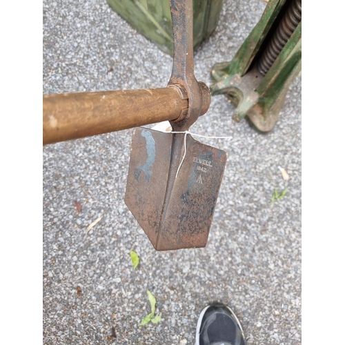 785 - A five ton jack; together with a military jerry; can and a WWII entrenching tool. (3)... 