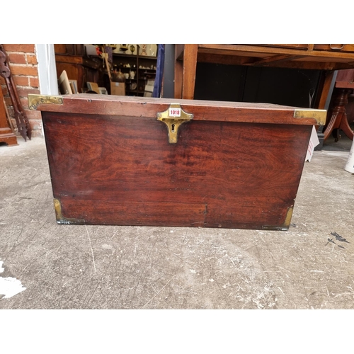 1018 - A 19th century mahogany and brass bound coffer, 40.5cm high x 81.5cm wide x 41cm deep.... 