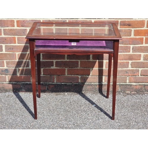 1056 - A circa 1900 mahogany bijouterie table, 69cm wide.