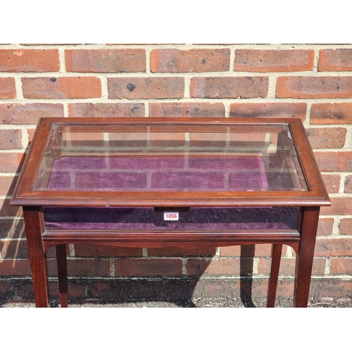 1056 - A circa 1900 mahogany bijouterie table, 69cm wide.