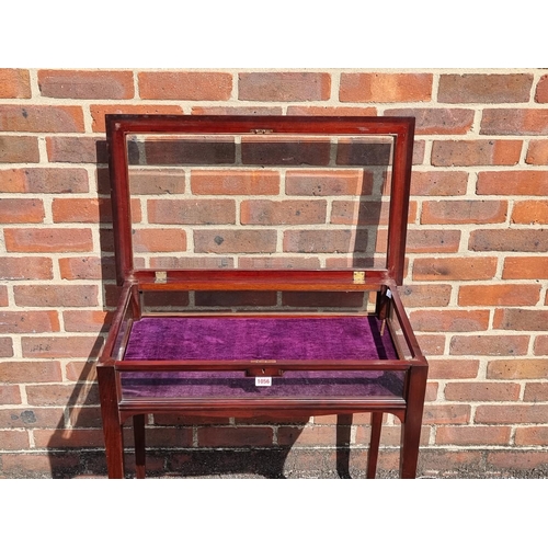 1056 - A circa 1900 mahogany bijouterie table, 69cm wide.