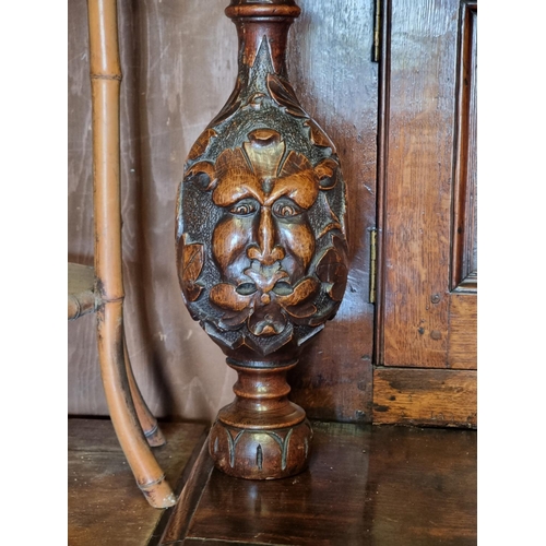 1080 - A large oak court cupboard, initialled and dated 1697, 181cm wide.