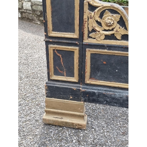 1083 - An antique continental ebonised and parcel gilt day bed, 131cm wide.