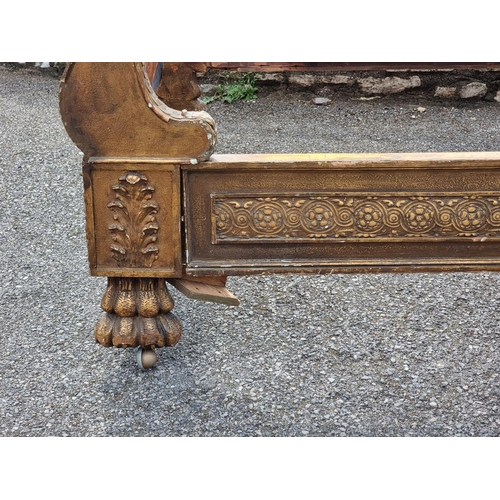 1084 - An antique continental gilt gesso bed, 139cm wide.