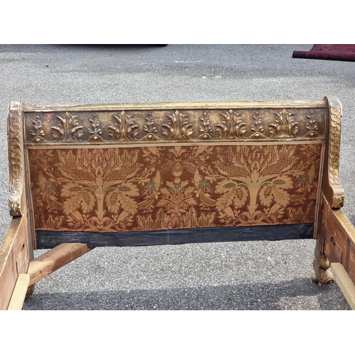 1084 - An antique continental gilt gesso bed, 139cm wide.