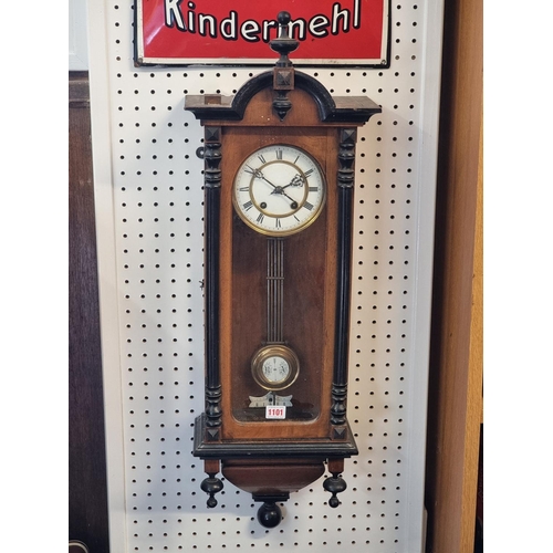 1101 - A late 19th century Vienna style walnut and ebonised wall clock, 88.5cm high.