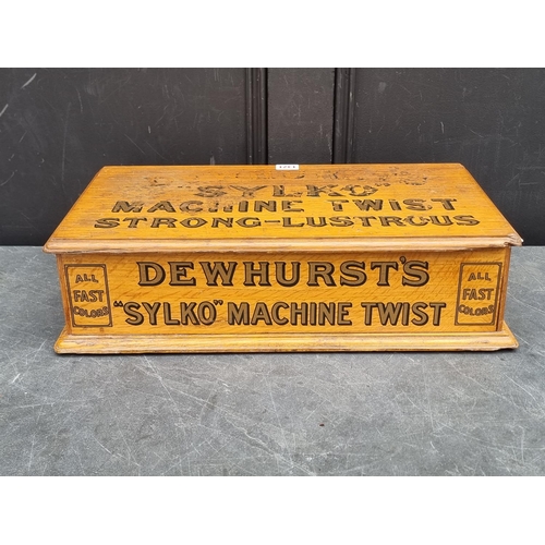 1321 - Advertising: a vintage oak 'Dewhurst's Sylko Machine Twist' spool chest, 51.5cm wide.... 