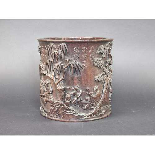 1378 - A Chinese carved hardwood brush pot, Qing, probably zitan, inscribed, relief carved and pierced with... 