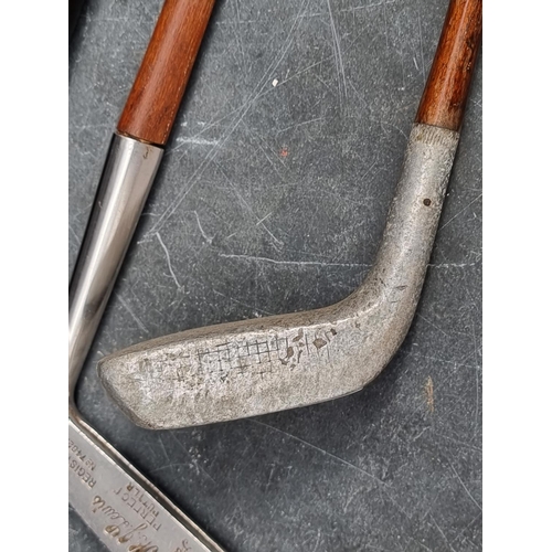 1419 - Of Golfing Interest: a vintage M.J. Lewis 'Perfect Putter', with greenheart shaft; together with ano... 