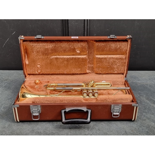 1680 - A Yamaha brass trumpet, in fitted case. 