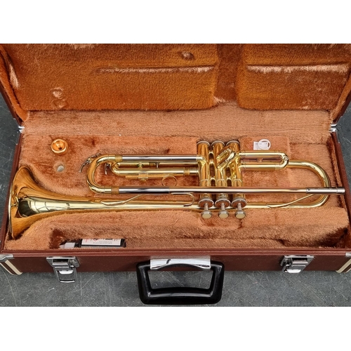 1680 - A Yamaha brass trumpet, in fitted case. 