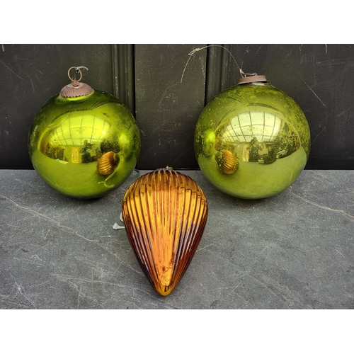 1688 - Two antique green glass witches' balls, largest 14cm diameter; together with a vintage French ribbed... 