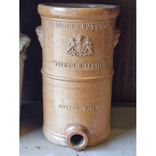 1726 - A Victorian stoneware 'Carbon Block Water Filter', 38cm high, (losses to decoration); together with ... 