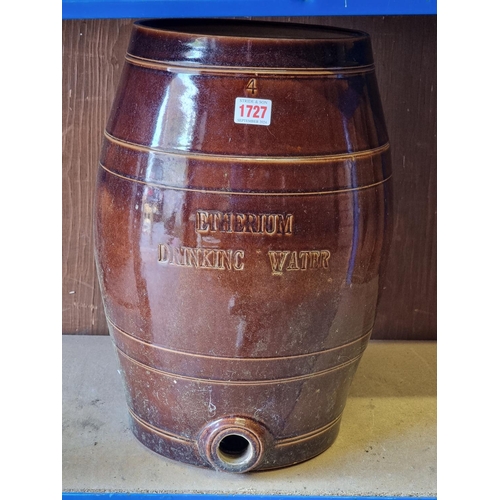 1727 - A Victorian brown glazed 'Etherium Drinking Water' barrel, 42cm high.