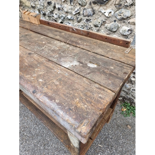 1720 - An old pine workbench, with small attached vice, 138cm wide.