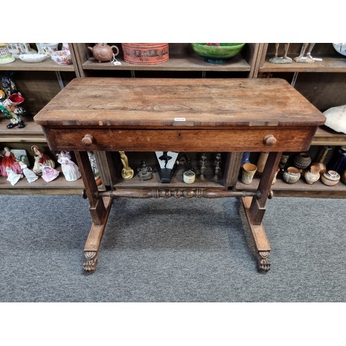 1038 - A Victorian rosewood centre table, 86.5cm wide.