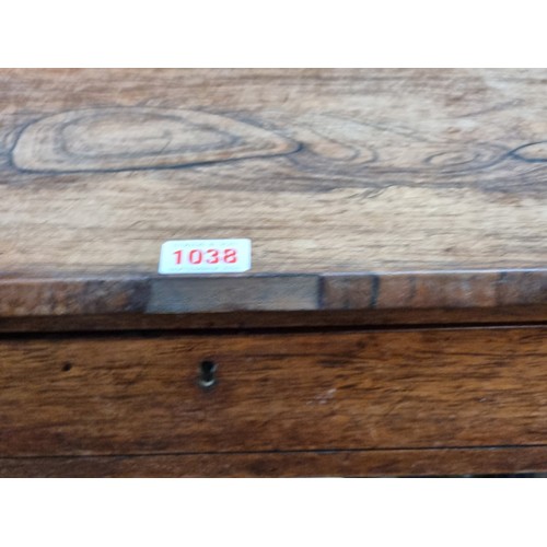 1038 - A Victorian rosewood centre table, 86.5cm wide.