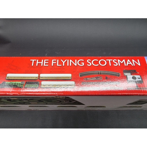 10 - Hornby: The Flying Scotsman, R1167, boxed train set, unused condition; together with 'Flyi... 