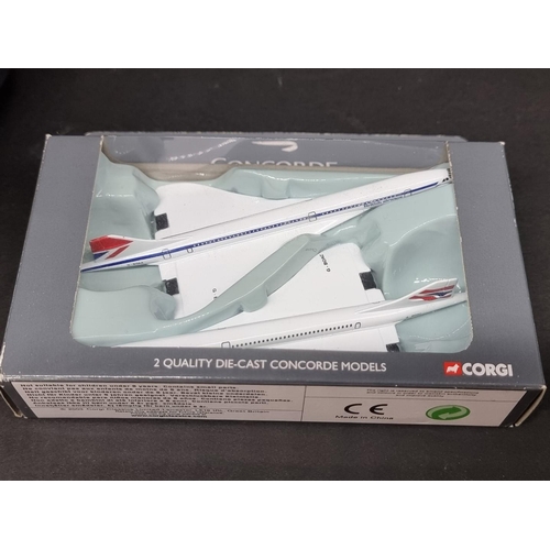 112 - Concorde: a Corgi 2 piece set No. CSCA05002; together with a British Airways 1/200 plastic model; an... 