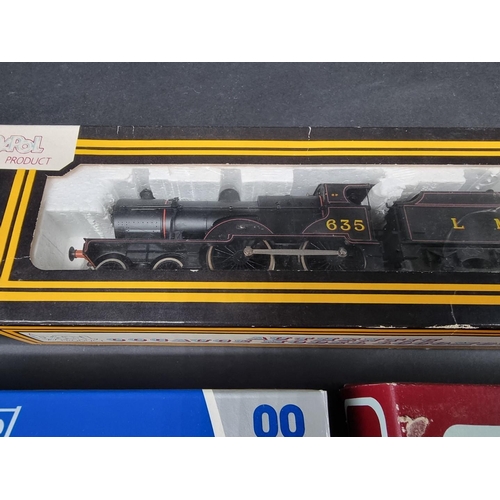 115 - Dapol: a locomotive and tender, No.635 LMS; together with four goods wagons, to include two 'Sussex ... 