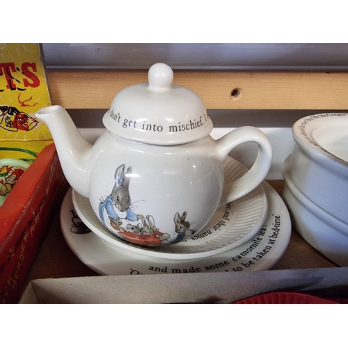 117 - Beatrix Potter: a small collection of Peter Rabbit Wedgwood items, to include teapot and two bo... 