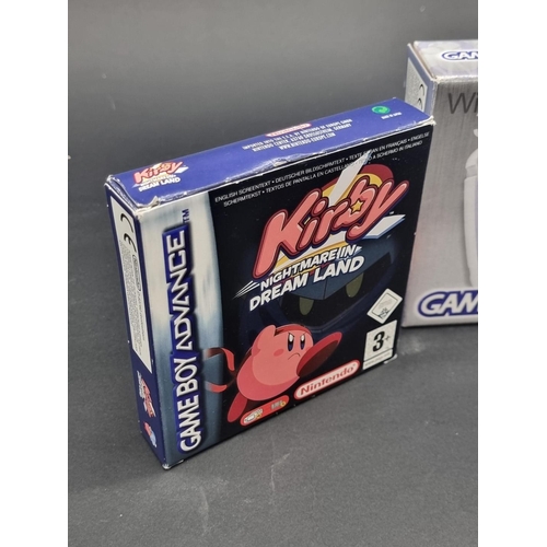 12 - Video Games: a 'Glacier' Nintendo Game Boy Advance, together with 'Kirby - Nightmare in Dr... 