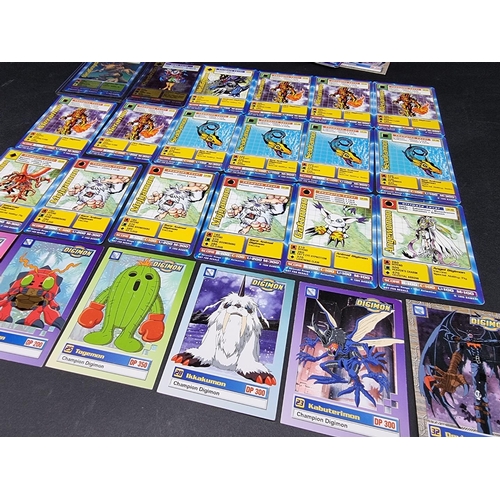 125 - Digimon: a small quantity of trading cards, to include a 1999 promo holographic Metal Greymon e... 