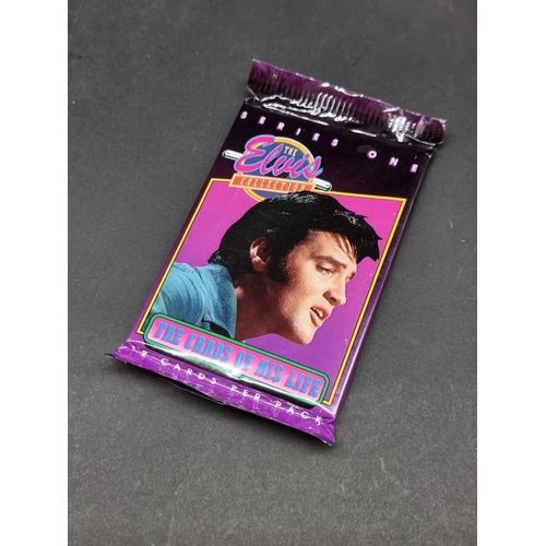 129 - Trading Cards: The Elvis Collection, a large quantity of sealed and opened cards.