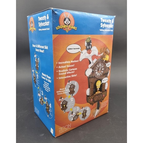 17 - Looney Tunes: a Tweety and Sylvester talking animated clock, boxed, components sealed.... 