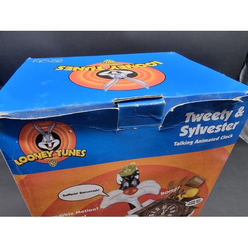 17 - Looney Tunes: a Tweety and Sylvester talking animated clock, boxed, components sealed.... 