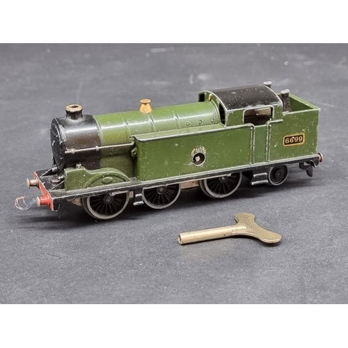 175 - Hornby: a circa 1930's 'GWR' clockwork locomotive, with winding key.