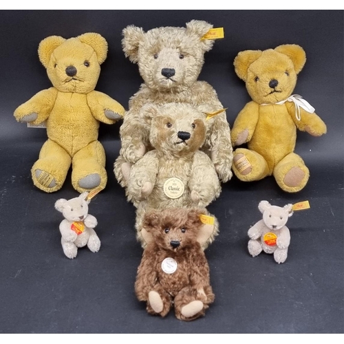 176 - Steiff: a 1920 Replica golden mohair teddy and a smaller example (largest with growler); together wi... 