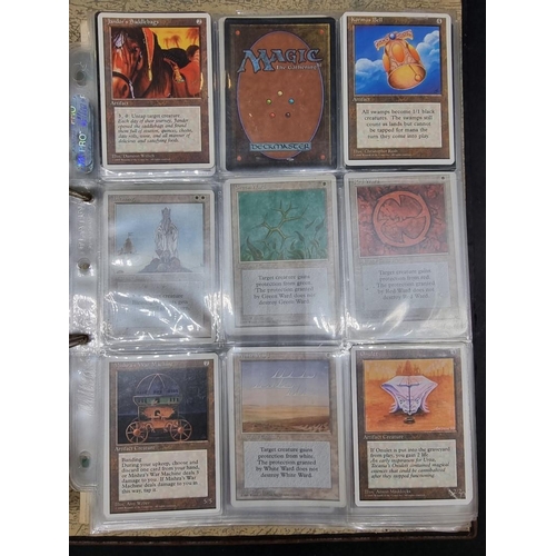 180 - Magic of the Gathering: two binders containing a large collection of trading cards, most dated ... 