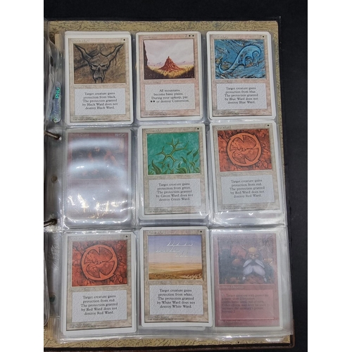 180 - Magic of the Gathering: two binders containing a large collection of trading cards, most dated ... 