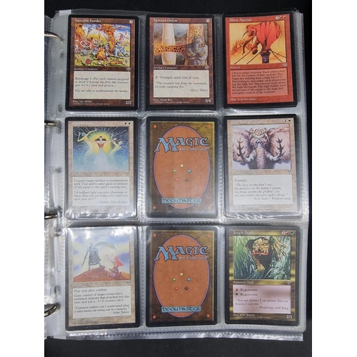 180 - Magic of the Gathering: two binders containing a large collection of trading cards, most dated ... 