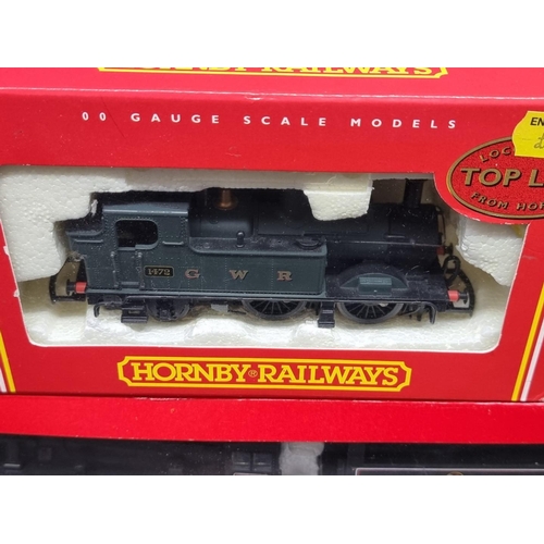 182 - Hornby: three boxed locomotives, to include Merchant Navy Class 'Canadian Pacific', R2171, and a GWR... 